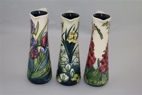 Three Moorcroft cylindrical ewers in Limia, Iris and Foxglove patterns, 1995-2002(-)